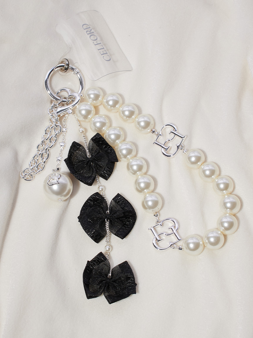 ロゴメタル付きパールチャームストラップ