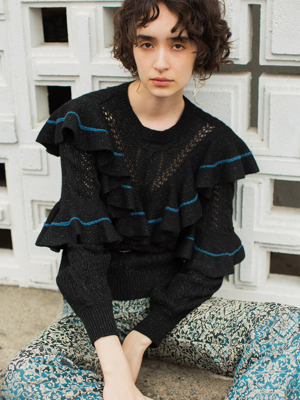 ケーブルフリルニットトップス