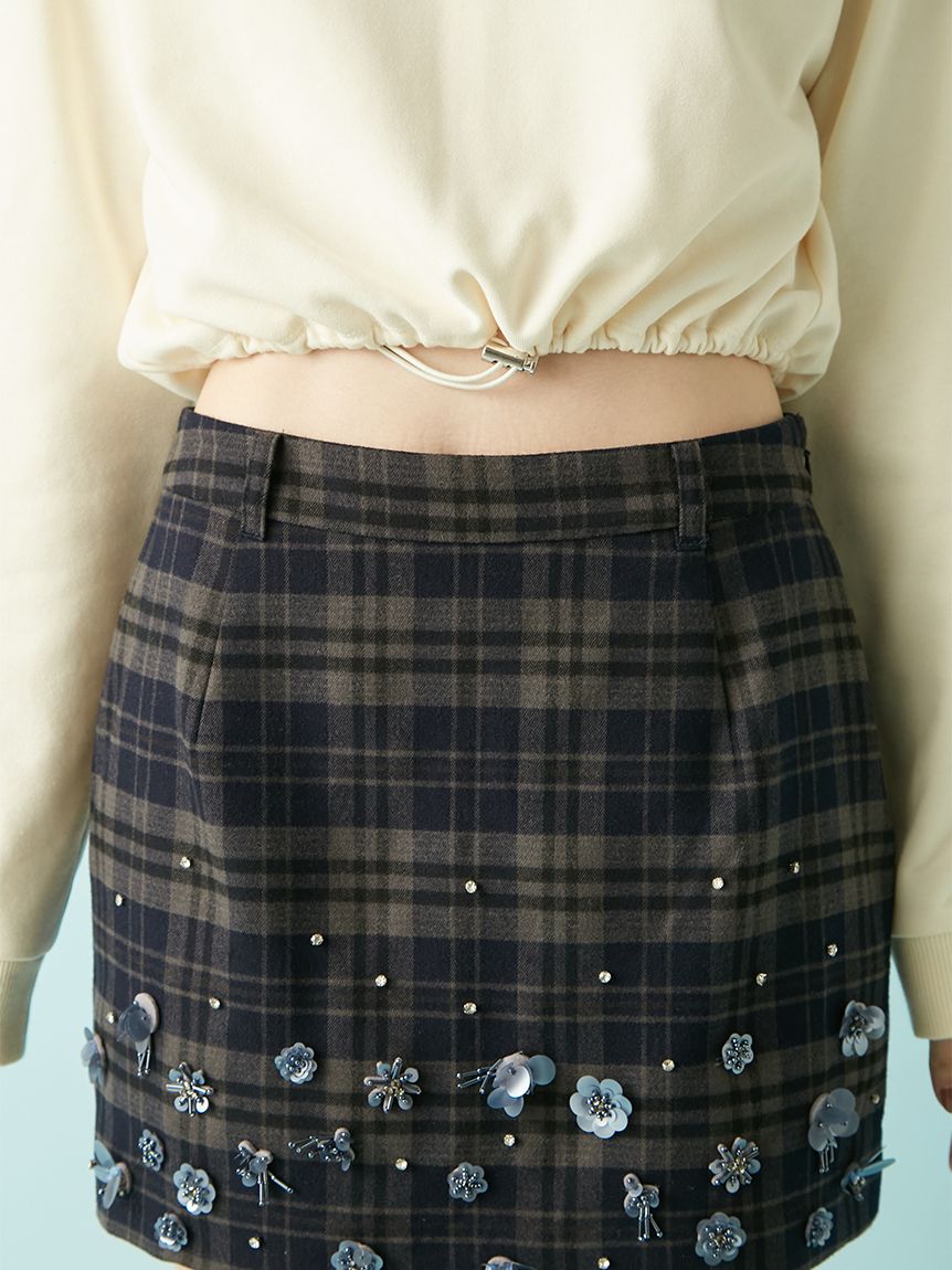 新品　リリーブラウン　ビジューリボンミニスカート LILY BROWN（リリーブラウン）の「【WEB限定カラー】[L.B CANDY